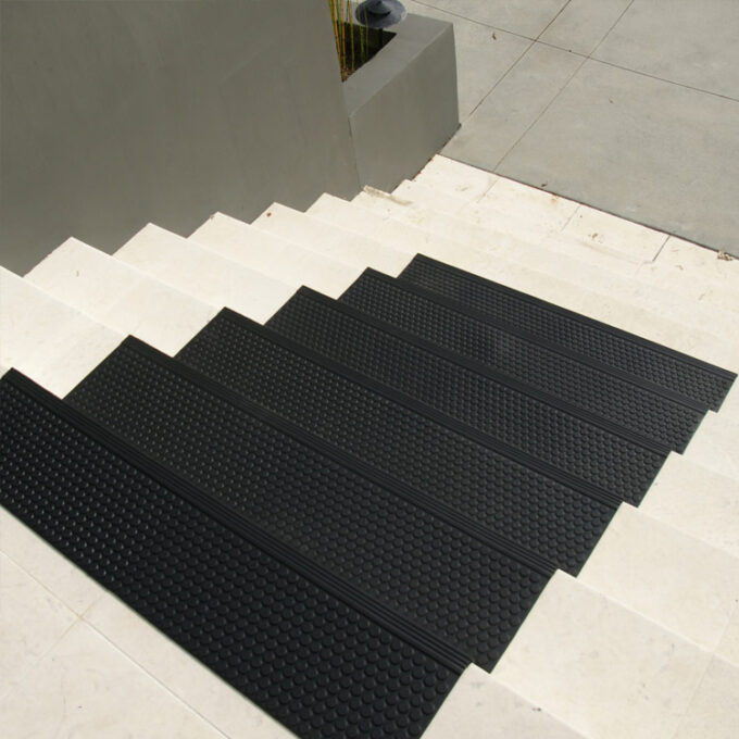 Black in color 6mm thick stair pads to increase comfort and withstand heavy foot-traffic on staircase