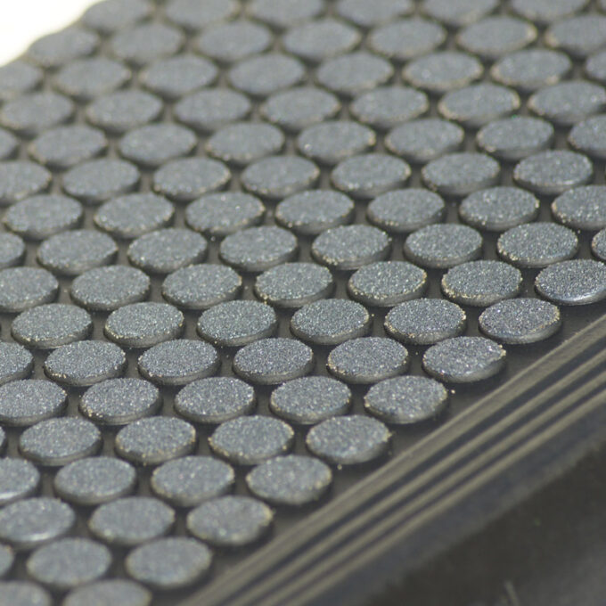 Black in color 6mm thick rubber steps to increase comfort, lessen impact, and withstand constant daily foot traffic.