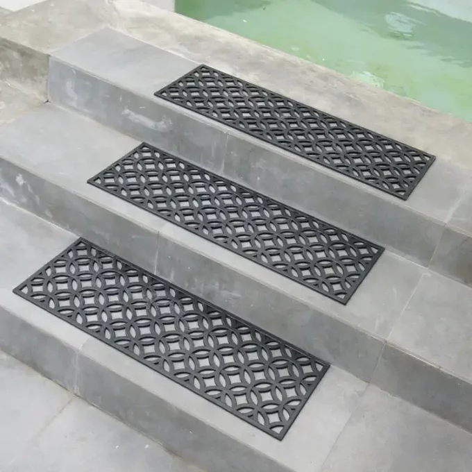 Stylish Step Mats Inspired by the Geometric Designs Used by the Aztecs placed on staircase near swimmingpool