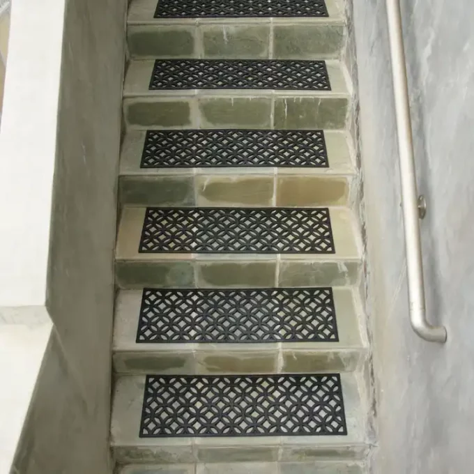 Stylish Step Mats Inspired by the Geometric Designs Used by the Aztecs placed on staircase
