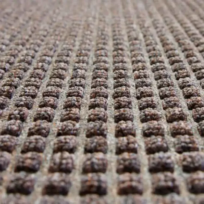 Brown in color Slip Resistant Rubber Backed Mat texture shot