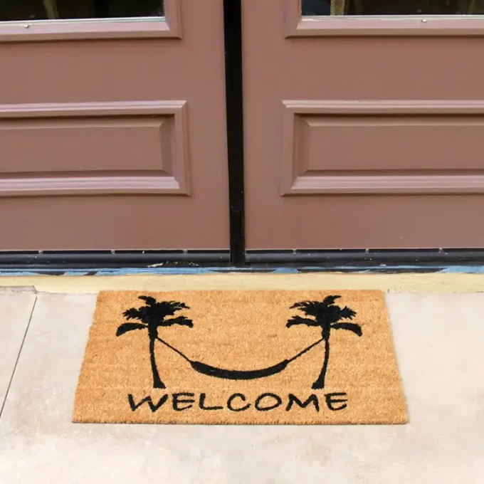 Doormat with two trees and a hammock