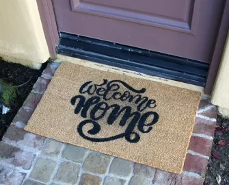 Welcome Home message with cute & curvy lettering