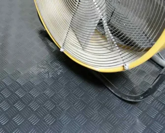 Black in color Lightweight, Easy to Install Flooring table fan is kept