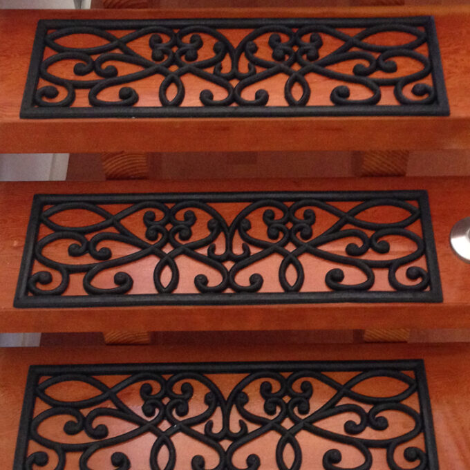 Black color anti slip, decorative and will Resist Moisture. Mold and Mildew stair mat placed on staircase