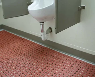 Grease-Resistant Rubber Mat red color placed on bathroom surface