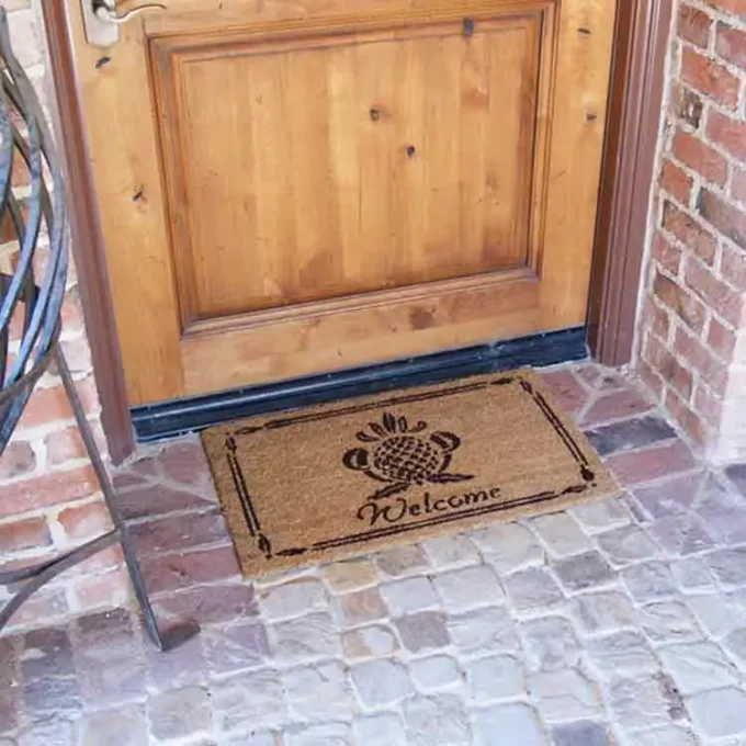 With a Tropical Feel with Pineapple sign, this Doormat invites Guests in!