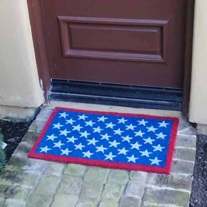Patriotic Doormat with red border & white stars on Blue surface