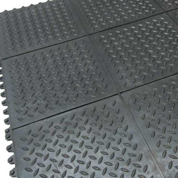 Tiles with bumper black border and inside slashes in repeated pattern inside