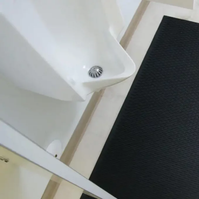 Black color Water-Resistant Rubber Runner placed in restroom