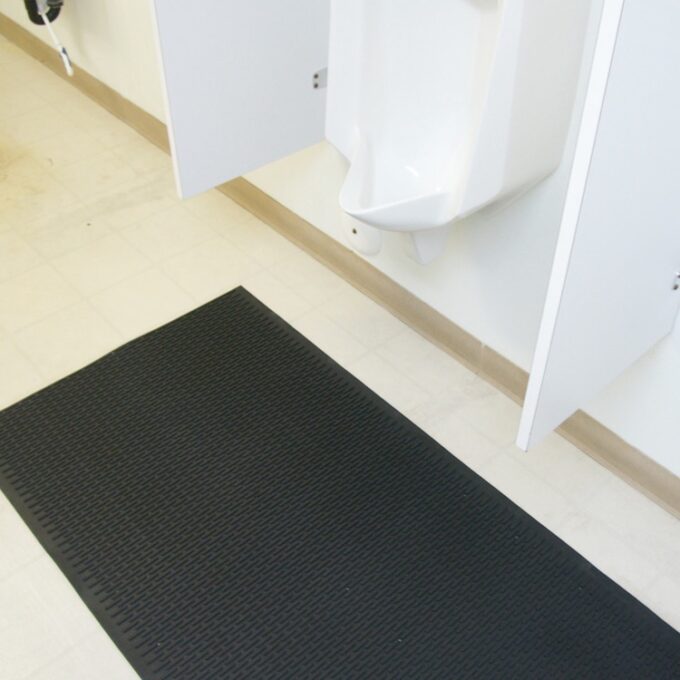 Black Safe Grip in Bathroom next to urinals