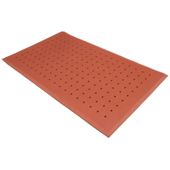 Red mat with dots lined up along it inside