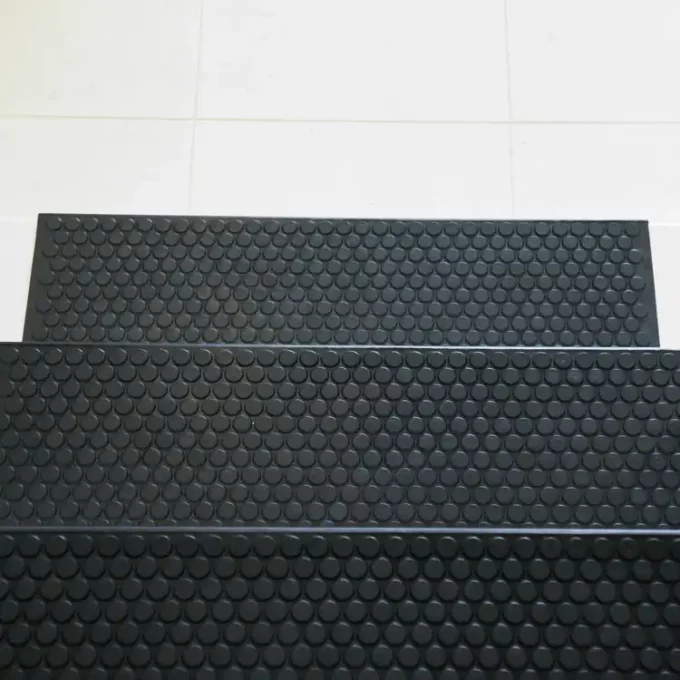 Black color Non-Slip, Ultra Durable, Indoor/Outdoor Stair Treads placed on staircase