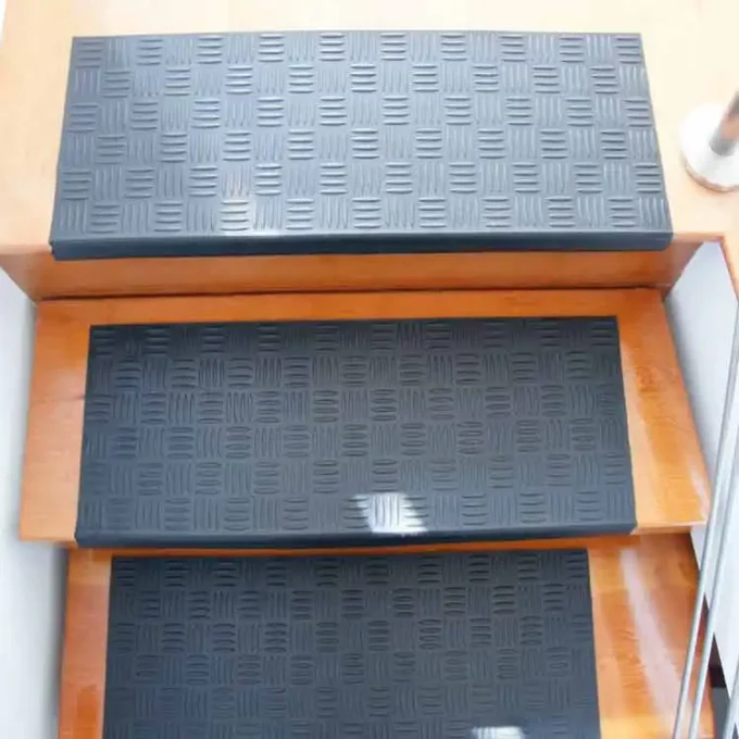 Black color Long-Lasting, Slip-Resistant Rubber Step Mats for Stairs placed on staircase