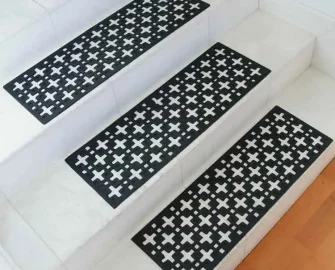 Non-Slip Stair Mat with Both a Functional and Aesthetic Design of stars placed on staircase