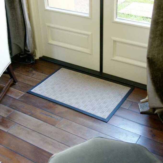 Tan Versatile Welcome Mat Traps Dirt and Prevents Slips placed at front door
