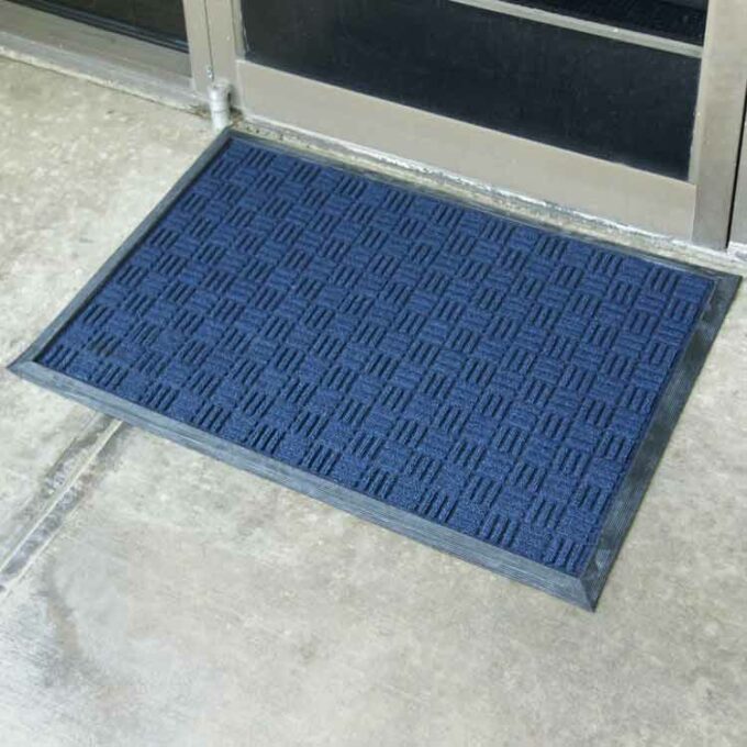 Blue Versatile Welcome Mat Traps Dirt and Prevents Slips placed at front door