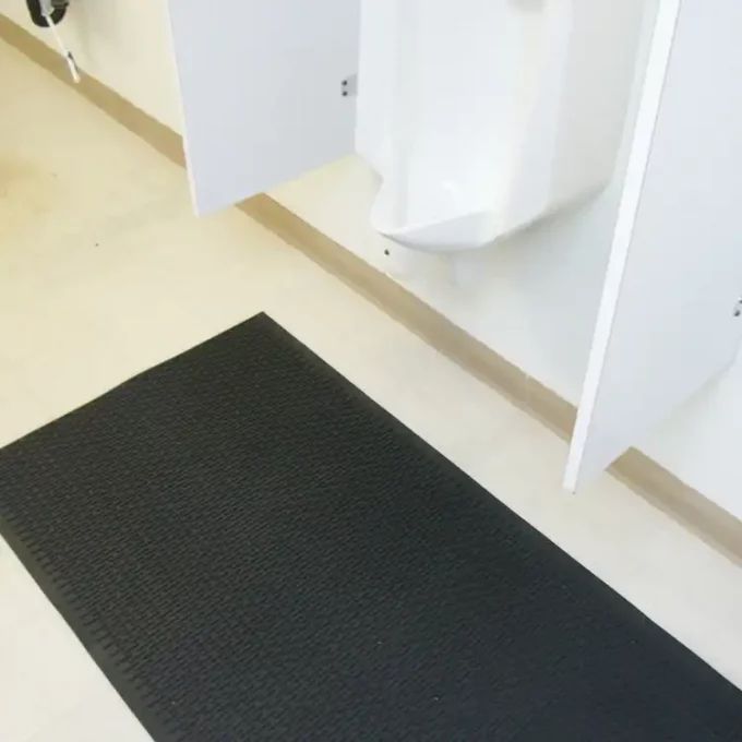 Safe Grip Tile laid on ground of bathroom floor next to a toilet