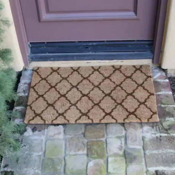 An Outdoor Coir Door Mat with an Stylish Old Moroccan Design in brown color