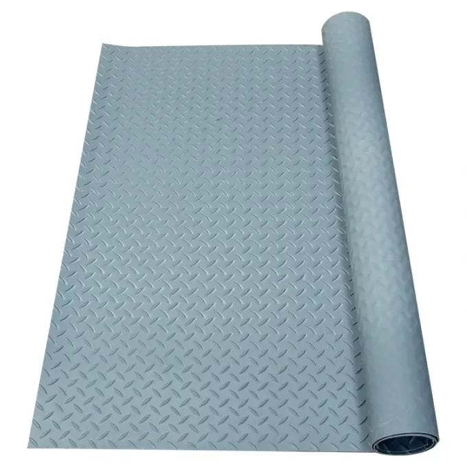 Diamond plate gray roll in front of a white background