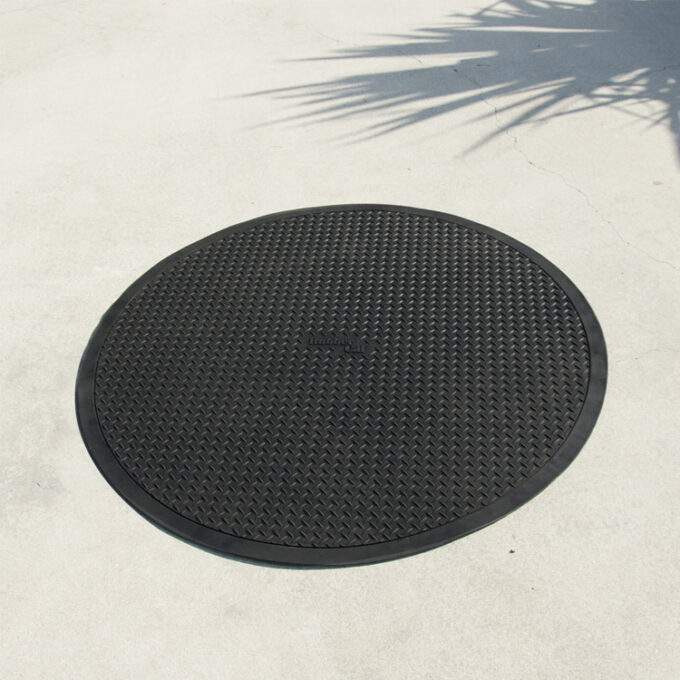 Black in color all-weather rubber mat designed for gas station applications