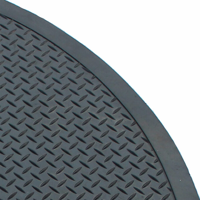 Black in color all-weather rubber mat designed for gas station applications showing texture