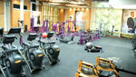 Picture of inside of a gym with workout equipments