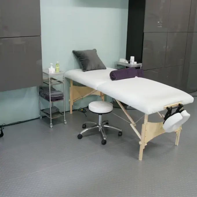 Coingrip flooring on top of a massage chair and cabinets