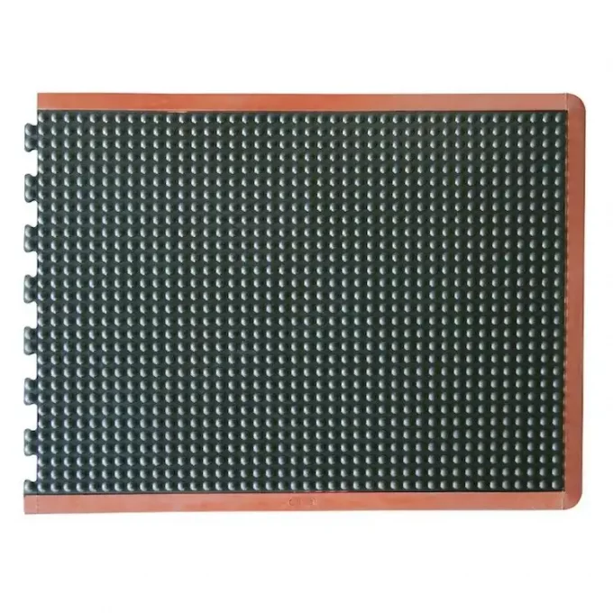 Red outline of a black tile Bubble-Top Interlock Mat Tile