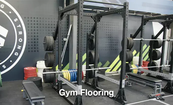 Gym flooring mat placed under heavy equipments