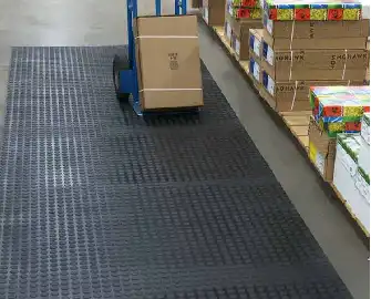 Black color floor mat placed in warehouse