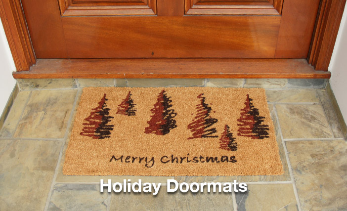 doormat in front of door with Christmas trees