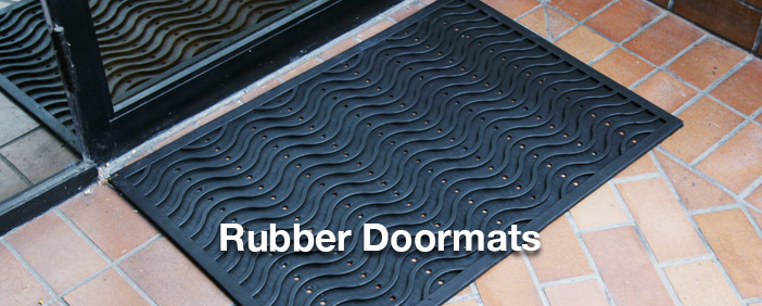 black rubber doormat in front of door.