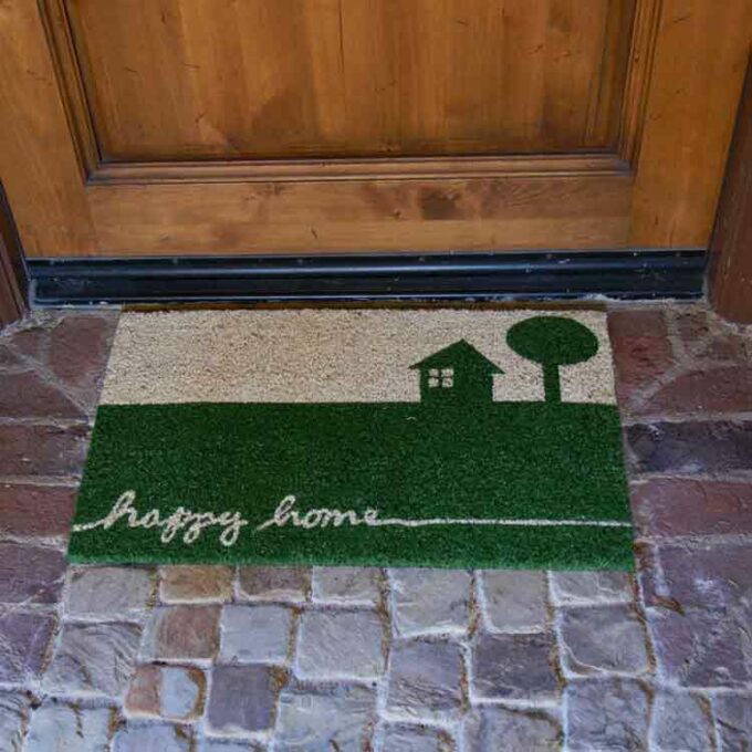 Quaint and Blissful Country Door Mat with pictures of tree and a house