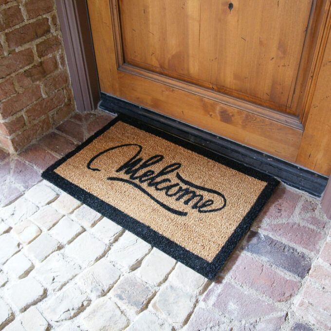 Welcome Mat with modern ribbon style script
