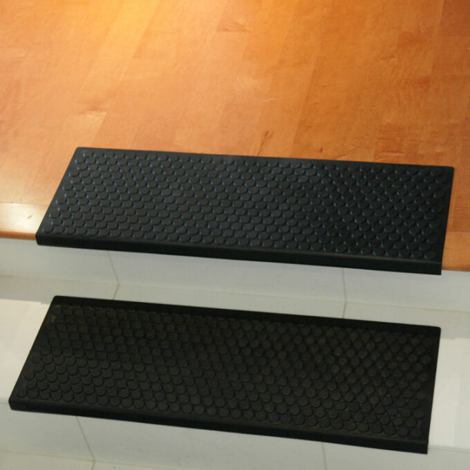 Ultra Durable Rubber Stair Mats black color placed on staircase closeup