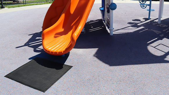 Playground Slide Landing Mat Under the Orange Slide
